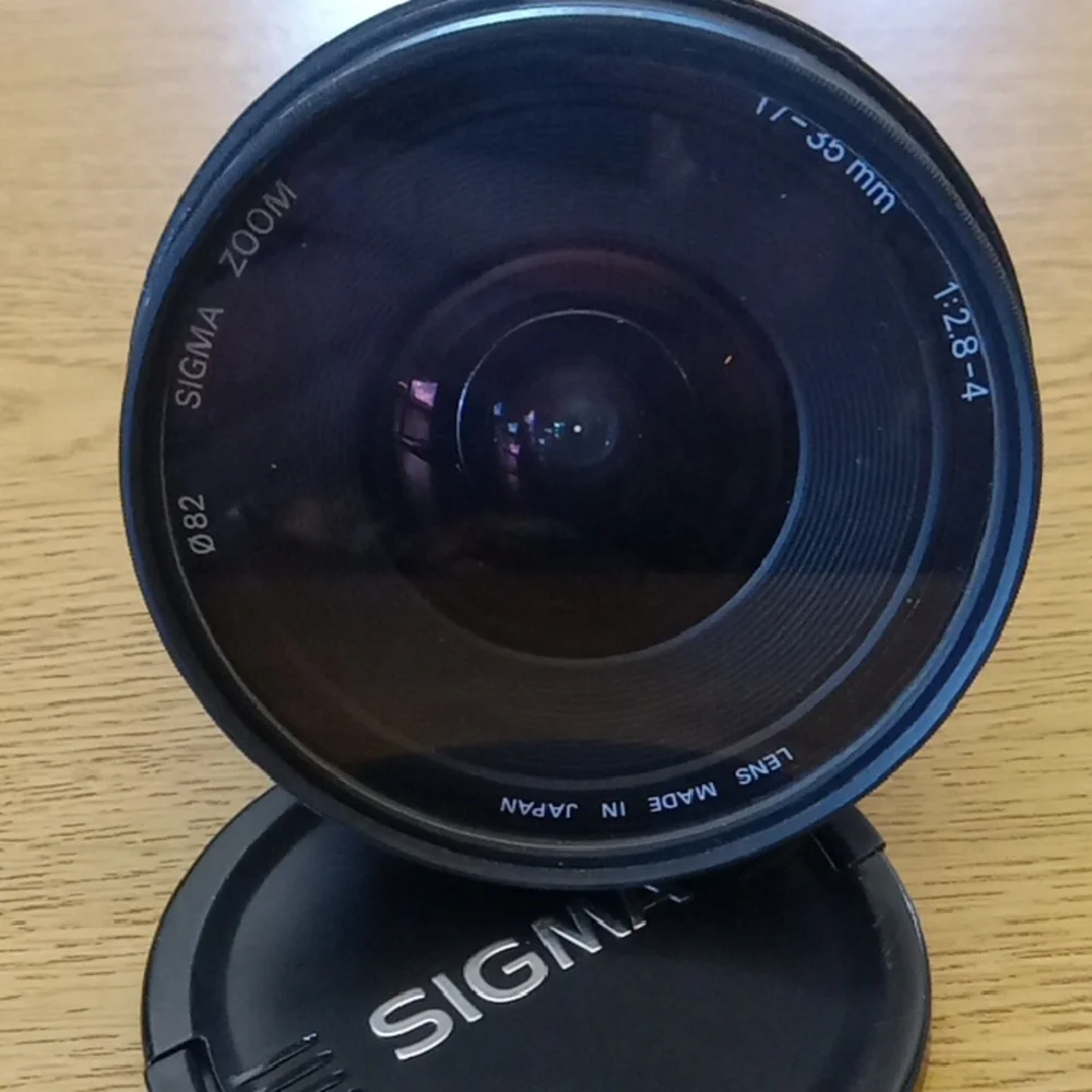 Sigma 17-35mmD Aspherical W/ Kenko UV SL-39 Beauty Black Lens with Gold Accents
